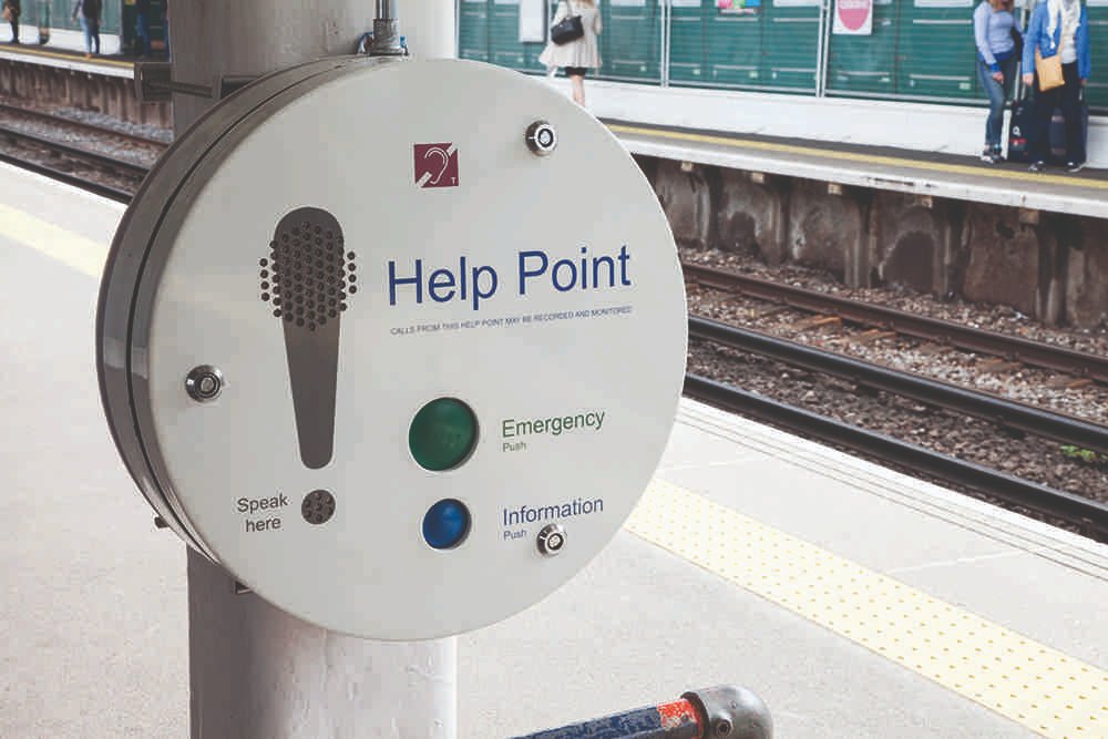 An image of the helppoint at a station
The green button is for the emergency line and assisted travel
The blue button is for information