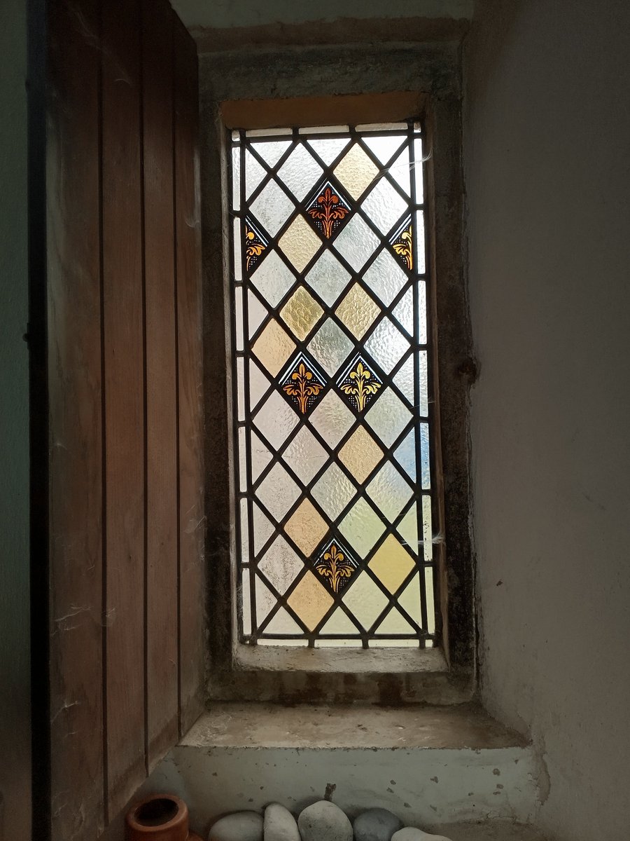 phil0073's tweet photo. In September at #StAndrewsBroughton . The lovely low northern Chancel window with shutter. Church open daily. #Northamptonshire. #PhilOnaBike @MaiTommie #TinyWindowTuesday #WindowsOnWednesday #WoodenWednesday #StainedGlassSunday https://t.co/ReNdea4Tdn
