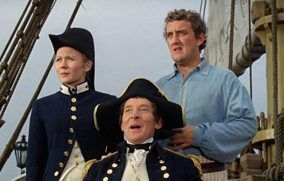 rbritanniapod's tweet photo. All at Sea with a Slightly Different Crew

For episode 204 of the Reel Britannia podcast, we are taking to the high seas and hoisting the mainsail for the 1964 nautical romp, Carry On Jack.

The story follows the earnest but hopelessly inept Albert Poop-Decker (the brilliant Bernard Cribbins), who takes a commission as a midshipman on the frigate Venus. Naturally, things go pear-shaped before he even leaves the tavern, leading to a frantic voyage involving a stolen identity, a remarkably resourceful young woman named Sally (Juliet Mills), and the decidedly cowardly Captain Fearless (Kenneth Williams).

Directed by series stalwart Gerald Thomas, the film features a lively score composed by Eric Rogers and marks Talbot Rothwell's second Carry On script following his debut with Carry On Cabby. But what makes Jack a particularly fascinating watch is who isn't on deck. Scott is joined by Steven, Tony, and Mark to debate a crucial question for the franchise's history: does the film suffer from a lack of familiar faces like Sid James and Joan Sims, or do Cribbins and Mills make a thoroughly welcome addition to the family? Along with spotting Jim Dale (making another welcome appearance after Cabby) and enjoying Charles Hawtrey as the hapless Walter Sweetley, we'll be unpacking the picture in our familiar warm, conversational, and lightly irreverent style.

This episode, along with the complete Reel Britannia back catalogue, is available wherever listeners download their podcasts and at:
https://t.co/JQd9OG964x

If you're enjoying our cinematic voyages, please note that special bonus episodes are available through the Reel Britannia Patreon, inviting listeners to support the podcast and enjoy additional film discussions.

#CarryOnJack #BernardCribbins #JulietMills #KennethWilliams #BritishComedy #BritishCinema #CarryOnFilms #ReelBritannia #Podcast