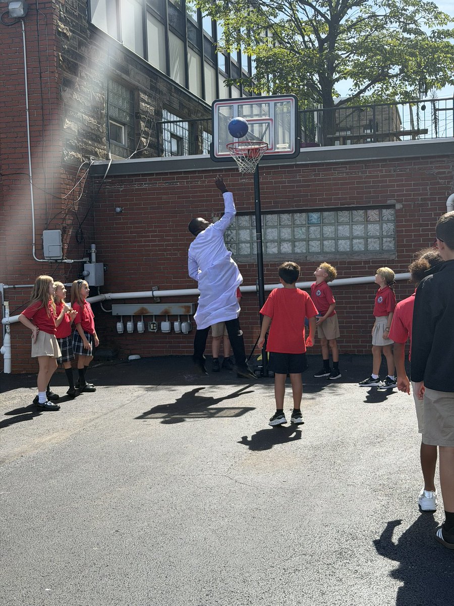 SSRCStrong's tweet photo. Faith, fellowship, and a little basketball!  Father Anthony spent some time outside with our students at recess, sharing smiles, laughter, and a few shots on the court. Moments like these remind us that our faith community grows through connection, joy, and togetherness. https://t.co/WzObA9EVP4