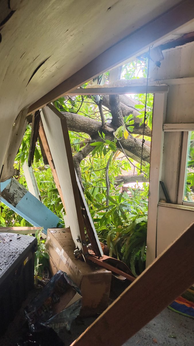 Seejhae_'s tweet photo. The aftermath:

My room genuinely got combo'd by getting the roof ripped off along with a whole mango tree falling onto it also. I'm glad the main part of the house is still in shape but repairs is gonna take a while, thank god I have a place to stay. https://t.co/PkVQlGzjGH