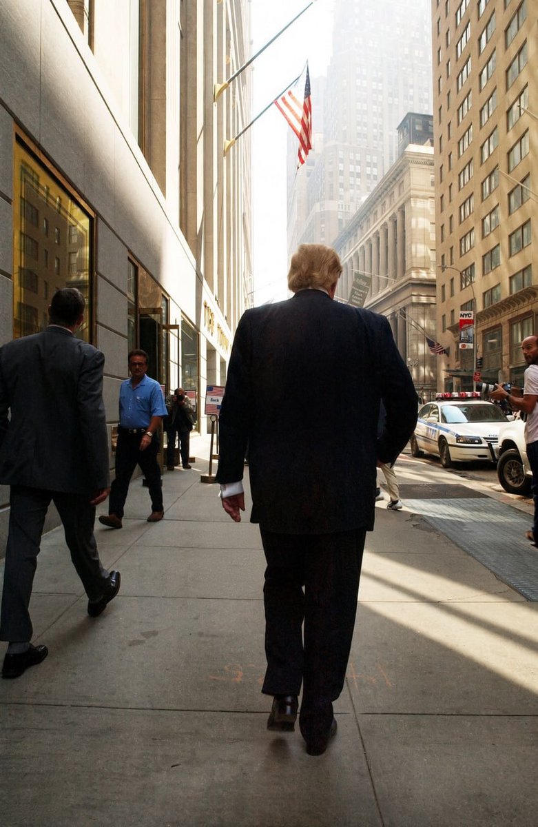 JackPosobiec's tweet photo. Donald Trump walking on Wall Street in the aftermath of the 9/11 attacks https://t.co/QwuPVAcS9g
