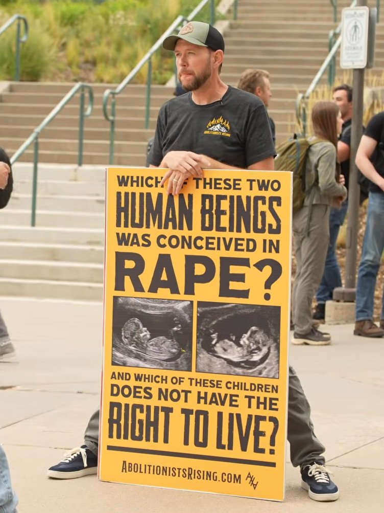 AbolitionRising's tweet photo. Imagine hating me and I'm just standing on your campus like this https://t.co/aHqlYkHZEj