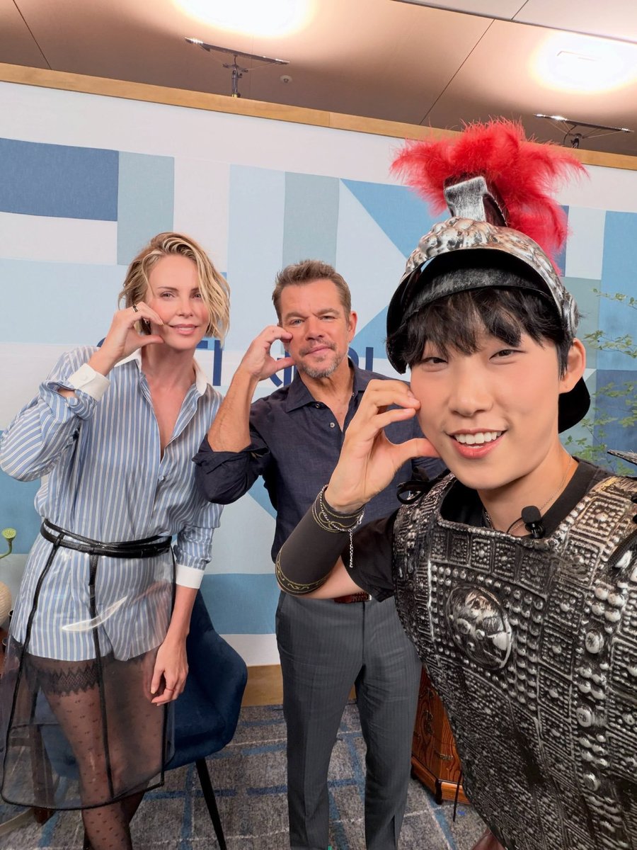 CTAOPF's tweet photo. Charlize Theron and Matt Damon participated in the MMTG Show during the promotion of The Odyssey in South Korea, alongside host Jae Jae.. https://t.co/6X9QfiiSLa
