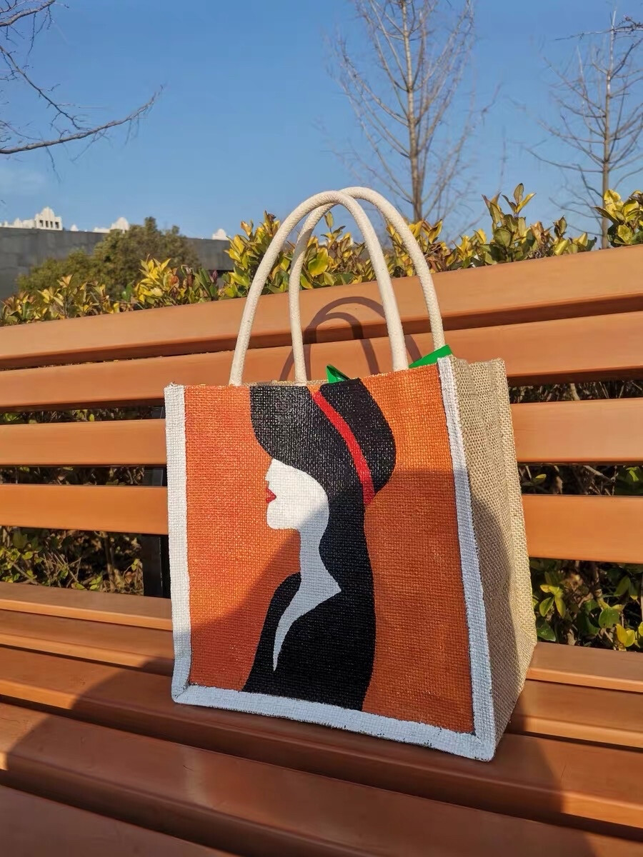 qine999's tweet photo. Just finished my hand-stitched linen tote bag! It’s got a little embroidered cat on the side—perfect for farmers’ market runs, zero waste, and 100% handmade love. Who else loves crafting useful, cute stuff https://t.co/xptV8AYgh0