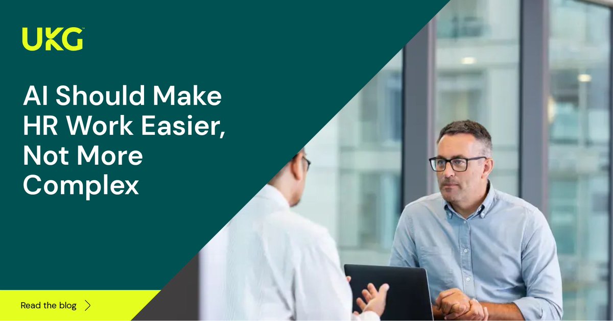 UKG logo & text: AI Should Make HR Work Easier, Not More Complex. Two men interact in a modern office; one in glasses looks at the other with a laptop. A 'Read the blog' button is at the bottom.