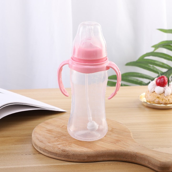 PauloPsss's tweet photo. Introducing our Wide Mouth PP Baby Feeding Bottle. Easy for little hands, perfect for big sips. Available in Pink, Green, Sky Blue, and Brown. Sizes: 330ml and 260ml. Made from safe PP plastic. https://t.co/5Mp1ThLIDY