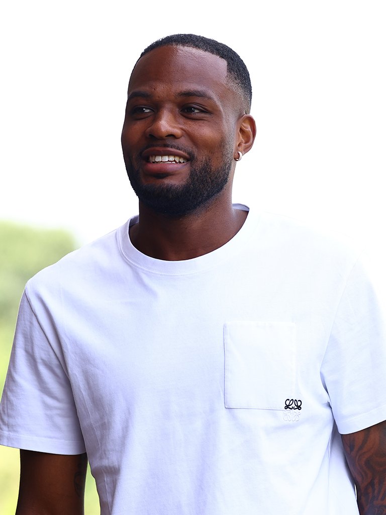 Cyle Larin smiles while walking into Staplewood Campus.