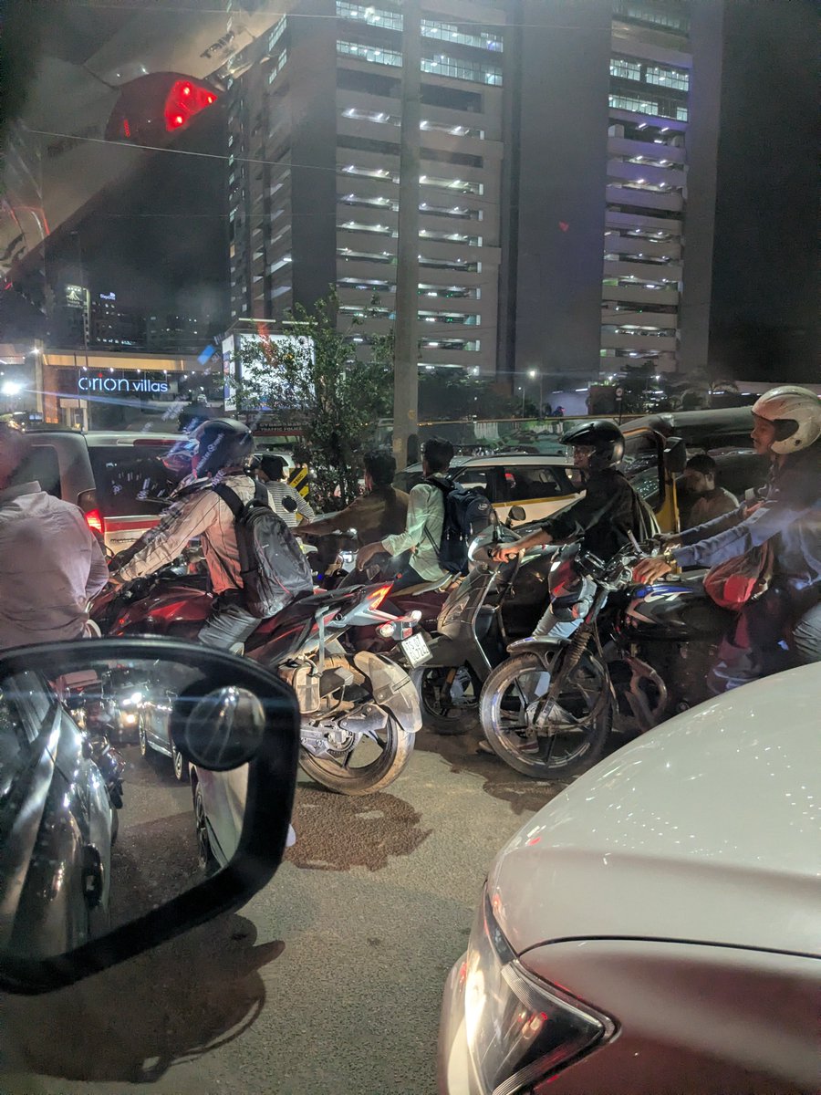 sndpg's tweet photo. @CYBTRAFFIC Thankyou for your response FYI people are pushing the barricades and crossing the road. It took 30 mins to cross the lane. Please do the needful 

#hyderabad #hyderabadtraffic https://t.co/NfL1M4ylbr