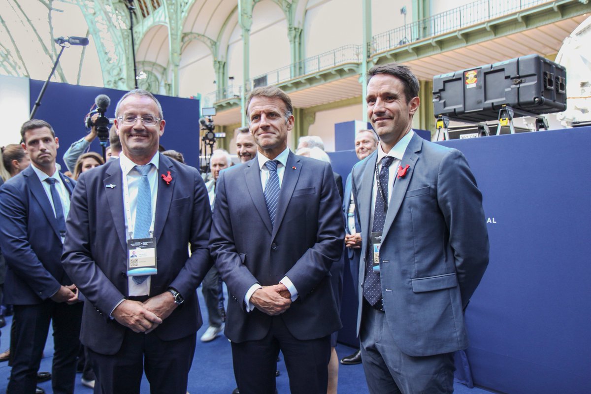 Jean Francois Fallacher, CEO of Eutelsat, is pictured alongside President Macron of France and Pierre Bertrand, CEO of Skynopy