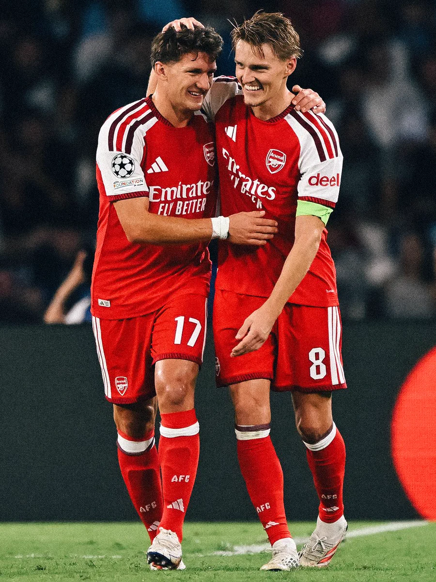 Martin Odegaard and Christos Tzolis celebrate together after Arsenal's goal