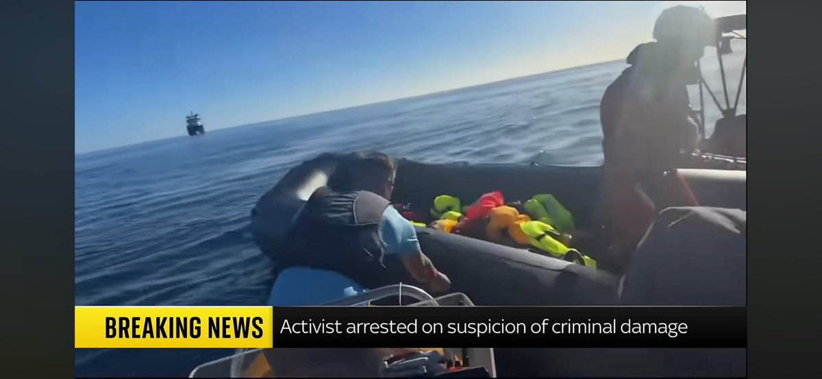 Fink_Kong's tweet photo. You know the clown live streamed it, right?
It literally shows the rescue worker already on the dinghy as Tommo’s boat approaches, so your claim that he only jumped aboard “after/during the slashing” doesn’t match the footage.

A lifejacket also doesn’t make deliberately slashing an inflatable boat at sea safe, and where’s the evidence this was “shallow water”? Even if Tommo shouted “jump in here”, that doesn’t suddenly give him licence to damage the vessel underneath someone.

And the “what about migrants being put into communities?” bit is just a completely different argument. You can oppose immigration policy all you like. It doesn’t mean these particular people were an immediate threat to anyone, and it certainly doesn’t turn a bloke with a knife interfering with a rescue operation into some sort of lifesaver.

“Tommo was saving lives” is an absolutely heroic interpretation of footage showing him stabbing an inflatable boat with a responder still on it.