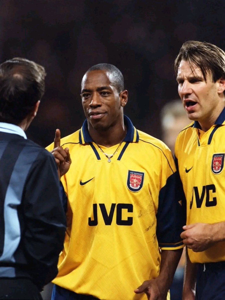Alarsenalnew's tweet photo. 🏴󠁧󠁢󠁥󠁮󠁧󠁿 Ian Wright wasn't supposed to become an Arsenal legend. He was still playing non league football when most lads his age were already trying to make their mark in the professional game.

Then Crystal Palace gave him a chance. Arsenal came next. And before long, Highbury had a new hero.

That was Ian Edward Wright, born on 3 November 1963 in Woolwich, south east London, a lad who grew up in a tough family and used football as his escape.

He left school at fourteen and worked as a plasterer to support a family that already had three children.

For years he played Sunday league football while working on building sites, and he had trials at several professional clubs but was never picked up.

By the time he was twenty one he had three children of his own and the dream of becoming a professional footballer was hanging by a thread.

Crystal Palace finally gave him a chance in 1985, but he turned down their offer three times before accepting a two week trial that turned into a three month contract.

From that moment his career took off and he never looked back.

At Palace he developed into a lethal striker and became the club's post war record goalscorer with 117 goals in all competitions.

In September 1991 Arsenal signed him for 2.5 million pounds, a club record at the time, and he repaid their faith immediately with a goal on his debut against Leicester City in the League Cup.

In his first league game for Arsenal he scored a hat trick against Southampton, a start that announced his arrival in emphatic fashion.

Two years after joining Arsenal he won his first major trophy as the club completed a domestic cup double in 1993.

The following year Arsenal won the Cup Winners' Cup, although Wright had to watch the final from the stands because he was suspended.

He became Arsenal's goal machine and finished as the club's top scorer for six consecutive seasons.

On 13 September 1997, in a match against Bolton Wanderers, Wright scored his 178th and 179th goals for Arsenal, breaking Cliff Bastin's long standing record as the club's all time leading scorer.

At the end of the 1997-98 season he finally won the league title with Arsenal, completing his collection of major honours at the club.

In total he scored 185 goals in 288 appearances for Arsenal, a record that stood until Thierry Henry surpassed it eight years later.

On the international stage he won 33 caps for England and scored nine goals, though many felt he deserved far more opportunities.

After leaving Arsenal in 1998 he joined West Ham United and scored the winner on his debut against Sheffield Wednesday.

He later had a loan spell at Nottingham Forest before playing for Celtic and Burnley, eventually retiring in 2000.

Across his career he played 581 league games and scored 387 goals for seven clubs in England and Scotland.

After retiring he became one of the most popular football pundits on television and radio, known for his passionate and honest personality.

He also wrote an autobiography, received an OBE, and became an icon to Arsenal fans who consider him one of the club's greatest ever players.

For a while, Highbury had a striker who made scoring look like the easy bit. Ian Wright didn't have a head start. He just refused to stop chasing. 

And if you were there, you didn't need a replay to know exactly who had scored.