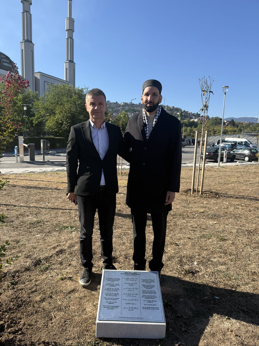 omarsuleiman's tweet photo. In 1993, while Sarajevo was under siege, my mother (rahimahallah) wrote a poem for a city she had never seen. It began: “O Sarajevo, I have wept for you, and in my hands remains nothing but tears.”

Over the last few years, I’ve read her poem in different settings in Bosnia. Someone suggested placing it in a memorial to her and planting a tree as a sadaqa jariya for her. Today, alhamdulillah, that happened in Alija Izetbegovic Park, in front of Istiklal Mosque.

The mosque was built by Indonesia in the 1990s as a gesture of solidarity with the people of Bosnia. It means so much to me that my mother’s words now have a place there. A Palestinian woman who saw her own people’s pain, and the Bosnian cause, as her own.

Standing next to me in the first photo is the only son of Shaheed Safet Hadzic (rahimahullah), a Bosnian hero who was martyred defending this area.

Thank you to Mayor Semir Efendic and everyone who helped make this possible, and to my brothers at Islamic Relief Canada, especially Emir Cacic and Tufail Husain, who followed through on this with so much care. Thank you also to Imam Edin and the community of Istiklal Mosque for welcoming my mother’s words.

If you go to Bosnia, and you should, please visit the park, read her poem, and make dua for her and all of the martyrs of Bosnia that she shed those tears for.