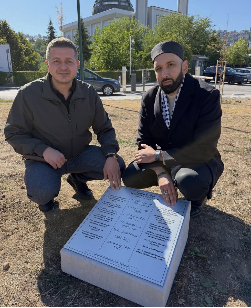 omarsuleiman's tweet photo. In 1993, while Sarajevo was under siege, my mother (rahimahallah) wrote a poem for a city she had never seen. It began: “O Sarajevo, I have wept for you, and in my hands remains nothing but tears.”

Over the last few years, I’ve read her poem in different settings in Bosnia. Someone suggested placing it in a memorial to her and planting a tree as a sadaqa jariya for her. Today, alhamdulillah, that happened in Alija Izetbegovic Park, in front of Istiklal Mosque.

The mosque was built by Indonesia in the 1990s as a gesture of solidarity with the people of Bosnia. It means so much to me that my mother’s words now have a place there. A Palestinian woman who saw her own people’s pain, and the Bosnian cause, as her own.

Standing next to me in the first photo is the only son of Shaheed Safet Hadzic (rahimahullah), a Bosnian hero who was martyred defending this area.

Thank you to Mayor Semir Efendic and everyone who helped make this possible, and to my brothers at Islamic Relief Canada, especially Emir Cacic and Tufail Husain, who followed through on this with so much care. Thank you also to Imam Edin and the community of Istiklal Mosque for welcoming my mother’s words.

If you go to Bosnia, and you should, please visit the park, read her poem, and make dua for her and all of the martyrs of Bosnia that she shed those tears for.