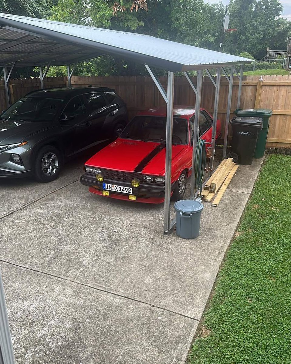 TiaraNatiello's tweet photo. The battery died and the hood latch cable snapped on the old Audi last week. The hood can be opened, but not easily. A replacement is on the way from Latvia, so the battery stays dead until it arrives. https://t.co/F6NFzEaP1a