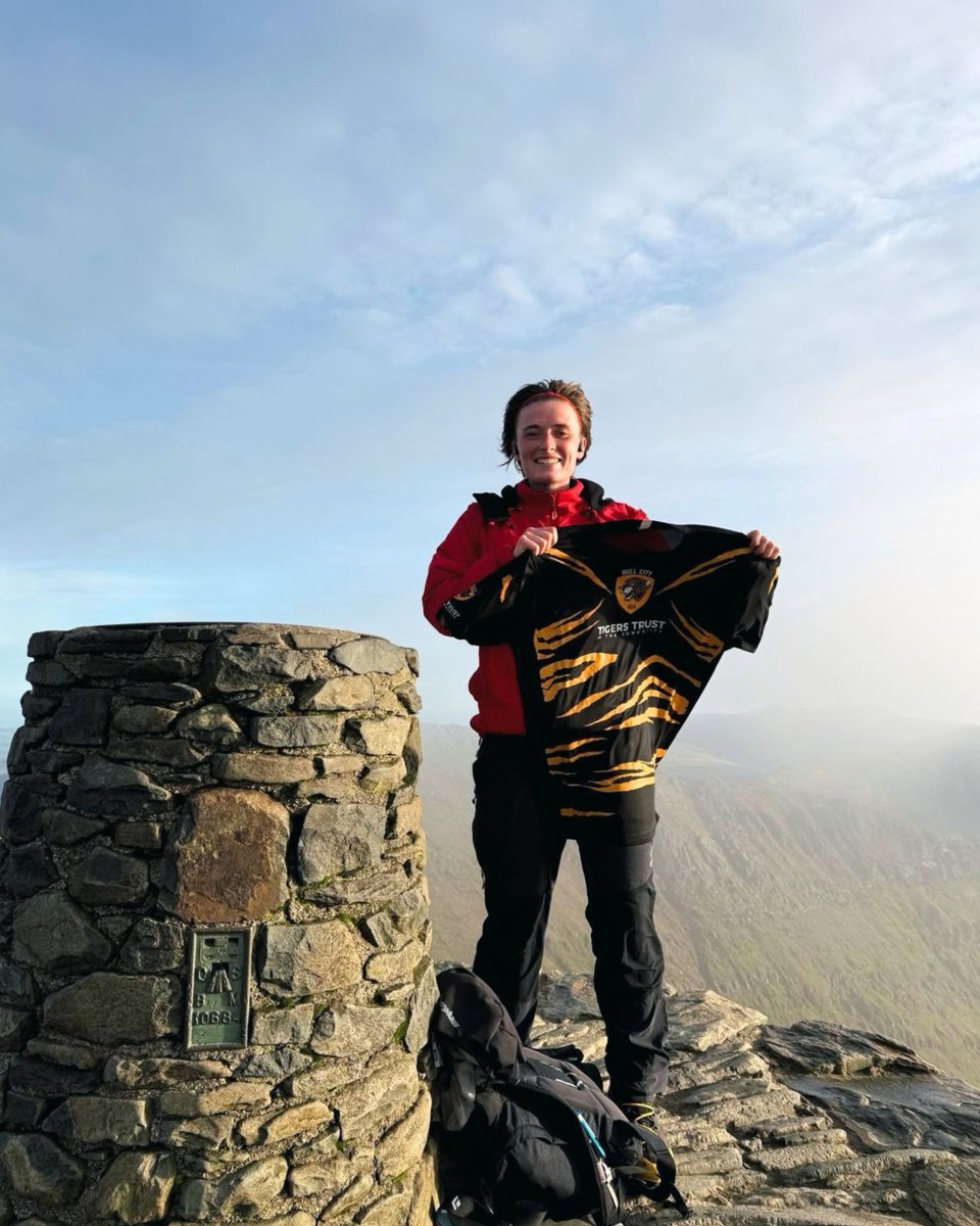 tigerstrust's tweet photo. Supporting the Tigers Trust from the summit of Mount Snowdon, the highest point across England &amp; Wales! 🏔️

This is the third of 15 peaks Amelia is taking on in her Welsh 3000s Challenge, raising vital funds to support the Tigers Trust. 🧡

➡️ https://t.co/4rEM5FPaUh

#hcafc https://t.co/zJ2bG6G6g9