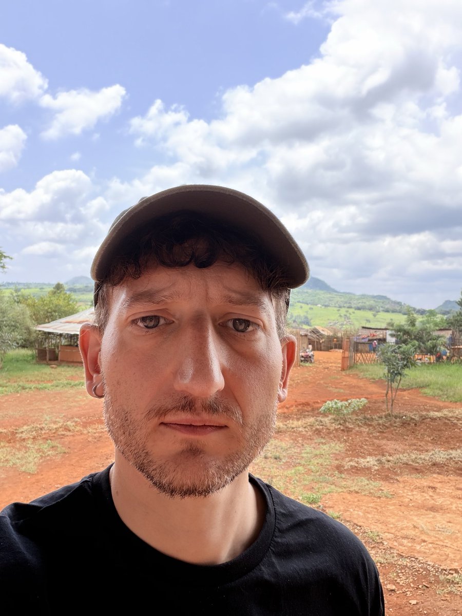 PhilipProudfoot's tweet photo. Me reading this tweet today in a Sudanese refugee camp. https://t.co/8X7a74aeyb