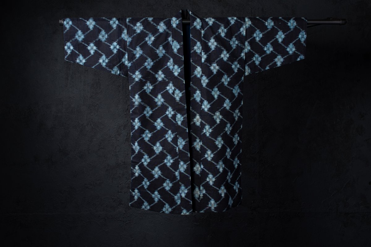 takayossh's tweet photo. Vintage Japanese indigo kasuri Noragi jacket with a striking diamond lattice ikat pattern.Long coat-style silhouette, traditional cotton workwear, and beautiful deep indigo character. One of a kind, from Japan.#Noragi #JapaneseIndigo #Kasuri #JapaneseTextile #JapaneseWorkwear https://t.co/37Ro6F4gvr