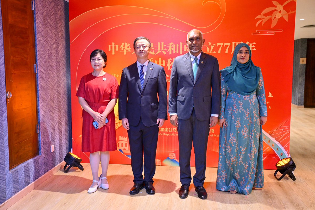 presidencymv's tweet photo. His Excellency President Dr @MMuizzu and First Lady @sajidhaamohamed attend the official reception commemorating the 77th Anniversary of the Founding of the People's Republic of China and Mid-Autumn Festival. https://t.co/IhX3xdb56C