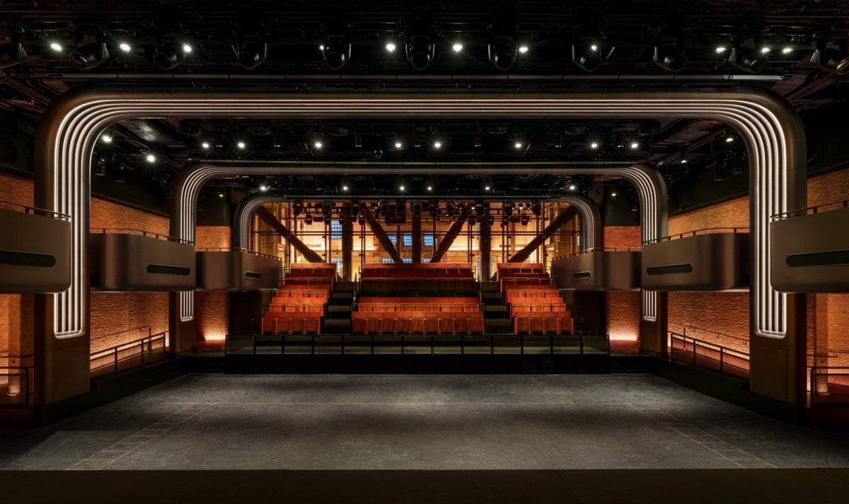 PopTingz's tweet photo. Apple has opened the Apple Music Hall, a new concert venue located at Battersea Power Station in London.

With a capacity of 600 people, the venue is designed for intimate performances and features a 48-speaker Spatial Audio system, two recording and mixing studios, infrastructure for over 16 cameras, and a broadcast control room.

The setup allows artists to perform and leave the venue with Spatial Audio recordings, a broadcast-ready mix, and multi-camera video footage; performances can also be livestreamed globally via Apple Music.

The company also opened new Apple Music Radio studios within the same complex, which will host London-based shows, as well as interviews, specials, and surprise performances for listeners around the world.