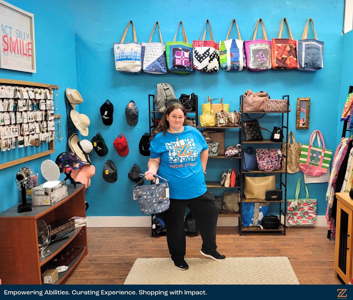 ZabsPlace's tweet photo. We’re back and open! Marsha’s already checking out the new accessories drop and found a favorite 👀

Would you pick this one? 

Your next find could help someone find their next opportunity 🧡💙

—
#ShopWithAPurpose at ZABS Place:
📍 100 North Trade Street, Matthews, NC 28105 https://t.co/NQsuNySMXH