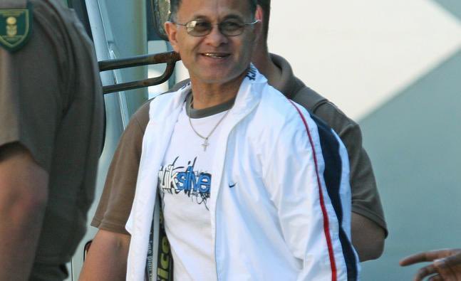 JvanLogg's tweet photo. Rashied Staggie, with his twin Rashaad, co-founded the Hard Livings in Manenberg in the early 1970s. The twins became internationally known through the BBC film Cape of Fear. 

Rashaad was shot and set alight by a PAGAD crowd on London Road, Salt River, on 4 August 1996. 

Rashied survived that decade, later claiming a born-again conversion, while police and researchers continued to identify him as Hard Livings leadership. 

He was treated as a fighting general in the 26s prison numbers. The Hard Livings functioned as both a street gang and a trafficking syndicate with chapters across the Western Cape.

In 2003 he was sentenced to 15 years for kidnapping and rape after ordering the gang rape of a 17-year-old who had turned state witness and pointed out a firearms stash. In 2004 he received a further sentence for burglary of the Faure police armoury. The terms ran concurrently. He was paroled in September 2013 after about 11 years.

On the morning of 13 December 2019 he was sitting in a vehicle outside a home on London Road, Salt River - the same street where his brother died  - when two gunmen shot him repeatedly. 

He was declared dead at Groote Schuur Hospital. Experts recorded three circulating motives: an internal Hard Livings succession fight, a break with the 28s, and an alleged fraud on Nigerian traffickers seeking Cape Town market access. 

In 2024 the state added the Staggie murder to the racketeering indictment against alleged 28s boss Ralph Stanfield and co-accused, including Jonathan Cloete. Those counts remain before the Western Cape High Court and are unproven until verdict.

The Hard Livings are still active. There is no publicly verified single successor to Rashied Staggie. It grew from a street crew into one of two Cape Town “super gangs” (the other being the Americans): drugs (Mandrax, tik), guns, extortion, prostitution and later wider organised crime. Research after Staggie’s death put them at about 6,000 members and presence in roughly 35 neighbourhoods, with the core still Manenberg, plus Mitchells Plain, Delft and Hanover Park. They were described as smaller than the Americans but more centralised. Historically they sat with the 26s prison numbers. In the 2025 Stanfield / “Firm” indictment the state treats Hard Livings as part of a 27s-aligned bloc fighting The Firm (28s). Street alliances shift; some 2026 briefings also list them with a Firm/28s camp against Fancy Boys expansion. 

In March - April 2026 Manenberg saw a public turf war with the Clever Kids (drive-by’s, four shot, two dead, including a 73-year-old bystander). 

In August 2026 five alleged Hard Livings members were charged in the Western Cape High Court for the March 2025 murder of Khuselwa “Coco” Ntshangase, dumped in a wheelie bin after she was labelled an informant for the Fancy Boys.