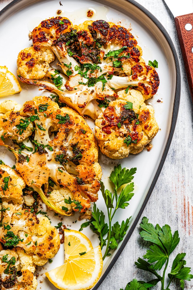 Diethood's tweet photo. These roasted #cauliflower steaks turn out tender and perfectly flavored with garlic and fresh lemon, making a delicious and easy vegetable side dish! #FoodieLife #recipes ➡️ https://t.co/puBlGHFwbp https://t.co/ItOfmuv49D