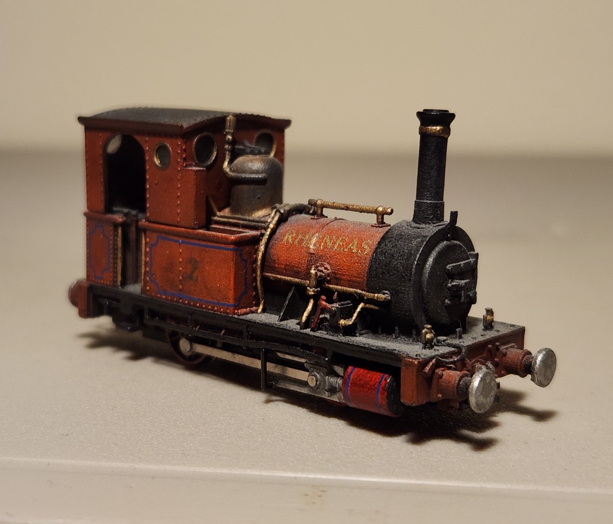 TheSludgeTender's tweet photo. "All the little engines were at the wharf on the day that Rheneas came home!" 

The Summer of Sludge concludes at last with my model of Rheneas, sporting his "Very Old Engines" look! https://t.co/VfNMpMjcqo
