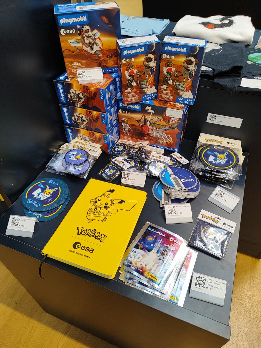 XploraSpace's tweet photo. 👩‍🚀⚡️ @thebanananoba, heureux visiteur du siège de l’Agence spatiale européenne à Paris, nous partage un aperçu des nombreux goodies de la collaboration entre Pokémon et l’ESA. Fans de Pikachu, il semble y en avoir pour tous les goûts ! https://t.co/EpmfnOV9Yi