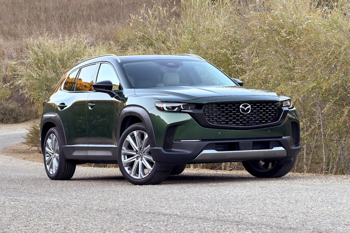 CarGurus's tweet photo. The 2026 Mazda CX-50 is all about style and spirited handling, but it's a bit cramped inside and has a stiff ride. Fun to drive, but expect a thirsty turbo engine and tech that's not the best. https://t.co/hWoUMvg9Kh https://t.co/zrlvkTkYGA