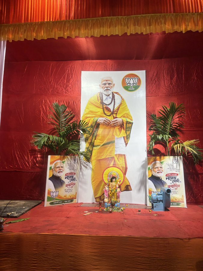 abasu4ever's tweet photo. In Behala East of Kolkata, a Vishwakarma idol was placed at the feet of Narendra Modi.

Why is there no outrage over this?

Do Hindus feel attacked and offended only when it's a Muslim?

Shameful! https://t.co/TefKWr1g39