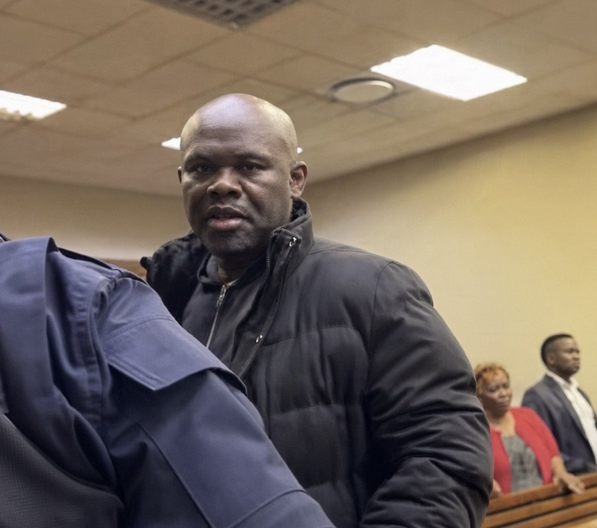 ISephara's tweet photo. What a disgusting person this Shadrack Sibiya is: 

A rapist, a GBV perpetrator, a man who threatens women and children. 

This is a picture taken in his first court appearance today. Fortunately his bail has been denied so he will remain in jail for 7 more days. https://t.co/0q00eILWET