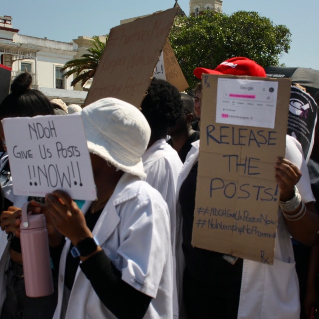 NPSM_Pharma's tweet photo. Pharmacy students from across the country took it to the streets of Pretoria, Grahamstown and Pietermaritzburg in response to the reduced number of internship posts. An internship mandated by the government and the pharmacy council. 
We demand answers now! 

#NDoHGiveUsPostsNow https://t.co/tCFDOBhqvy