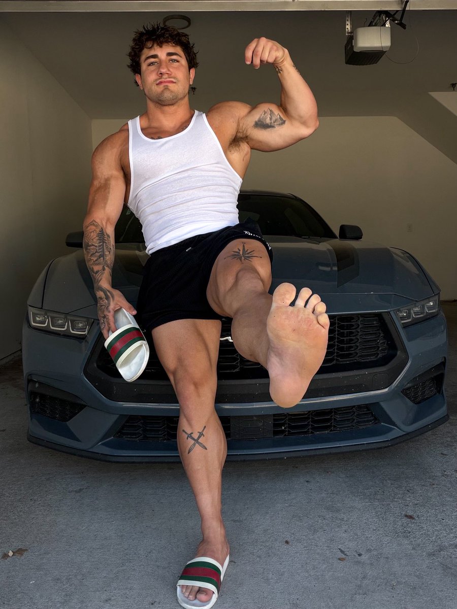 MasterLuke024's tweet photo. Sexy feet, sexy car, sexy muscles…😏 all that’s missing from this picture to make it perfect, is a sub worshipping😈 https://t.co/JXkGLJut8C