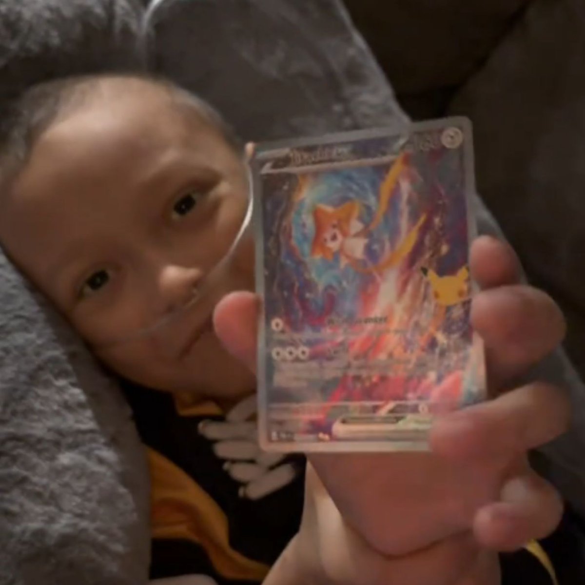 Dexerto's tweet photo. Avery The Poke Kid’s family shared his final Pokémon pack opening following the 12-year-old creator's death

He pulled a Jirachi SIR with "last pack magic" before signing off with "See you next time, trainers" https://t.co/WTbEJQhewo
