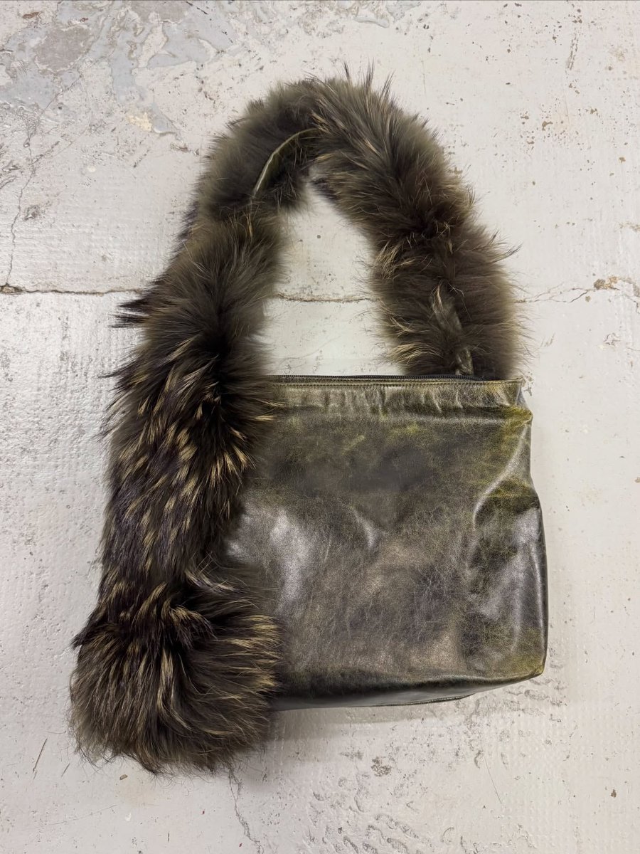 theattractmag's tweet photo. 2001 roberto cavalli dark olive leather fur handle shoulder bag https://t.co/cKvEayh7b7