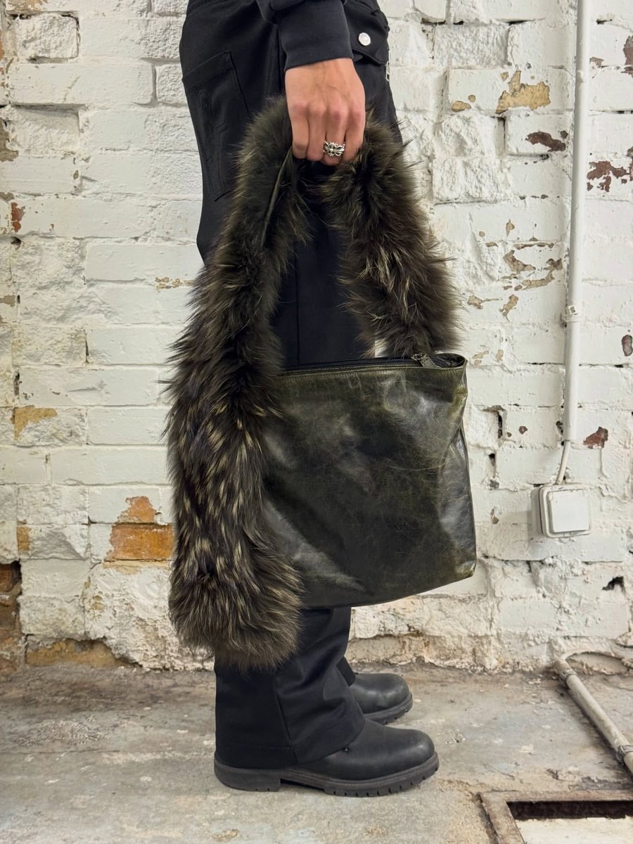 theattractmag's tweet photo. 2001 roberto cavalli dark olive leather fur handle shoulder bag https://t.co/cKvEayh7b7
