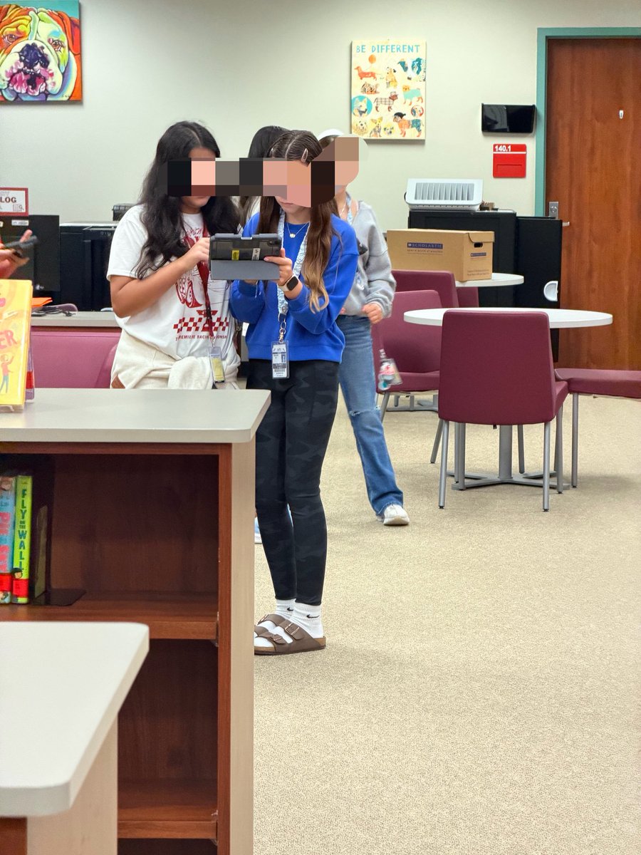 BeckJHLibrary's tweet photo. Scavenger hunting around the library with our 6th graders! @BeckJuniorHigh @katy_libraries @librarianerh #katylibraries https://t.co/Ox9lQmMkeA