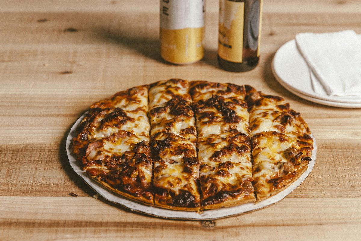 HeggiesPizza's tweet photo. Nobody has ever asked us to make the pizza smaller.

The Six Pack. 4 meats. 2 cheeses. 1 lb 14 oz.

Pls cut into squares. https://t.co/zWiSjtGu9m