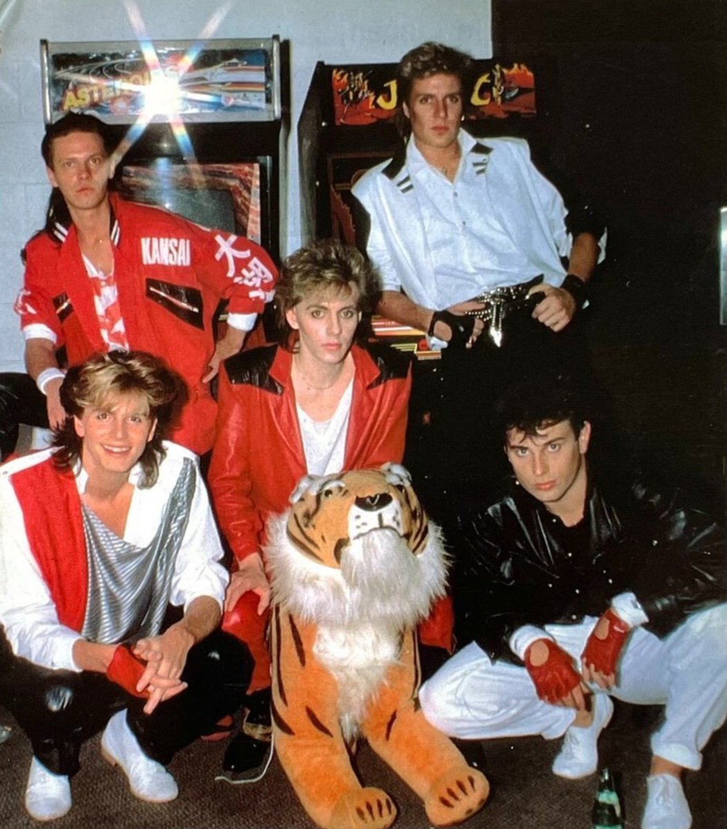 irisidol's tweet photo. Found this another photo of the boys... this looks even better! Everyone looks to the camera, John is smiling... Idk why not this photo was printed everywhere, it's perfect! 

This was in a Japanese magazine.
#duranduran https://t.co/JAthsrxWxw