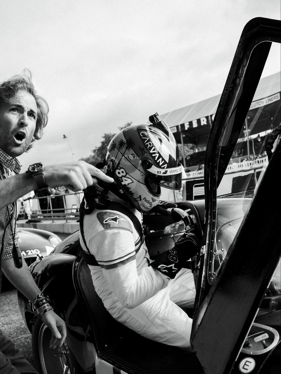 Me climbing into one of the amazing cars I got to drive this weekend at the revival, but in black and white (for aura farming purposes)
