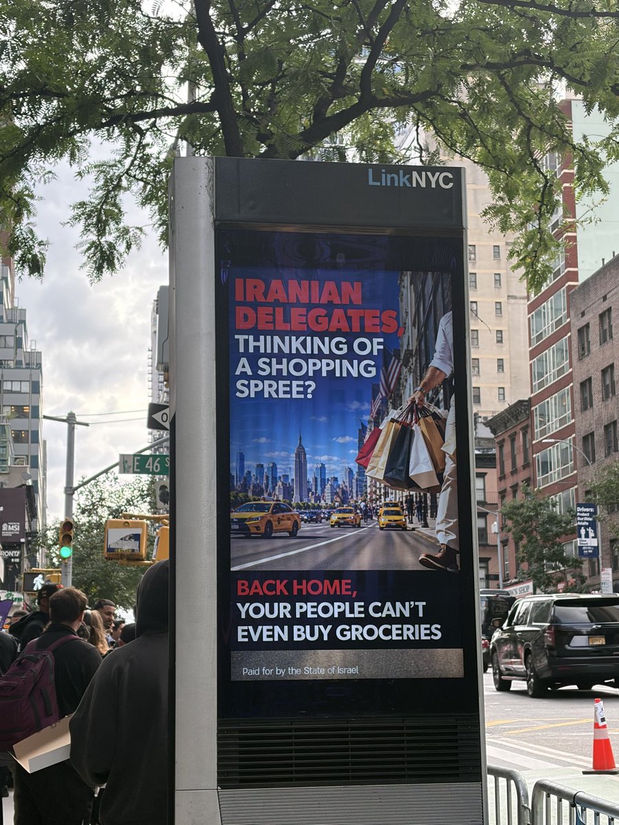 FarnoushAmiri's tweet photo. An ad on the streets of New York near the UN that is aimed at Iranian delegation who the US has banned from shopping while here. 

“Paid for by the State of Israel” https://t.co/qG8cGiDOQR