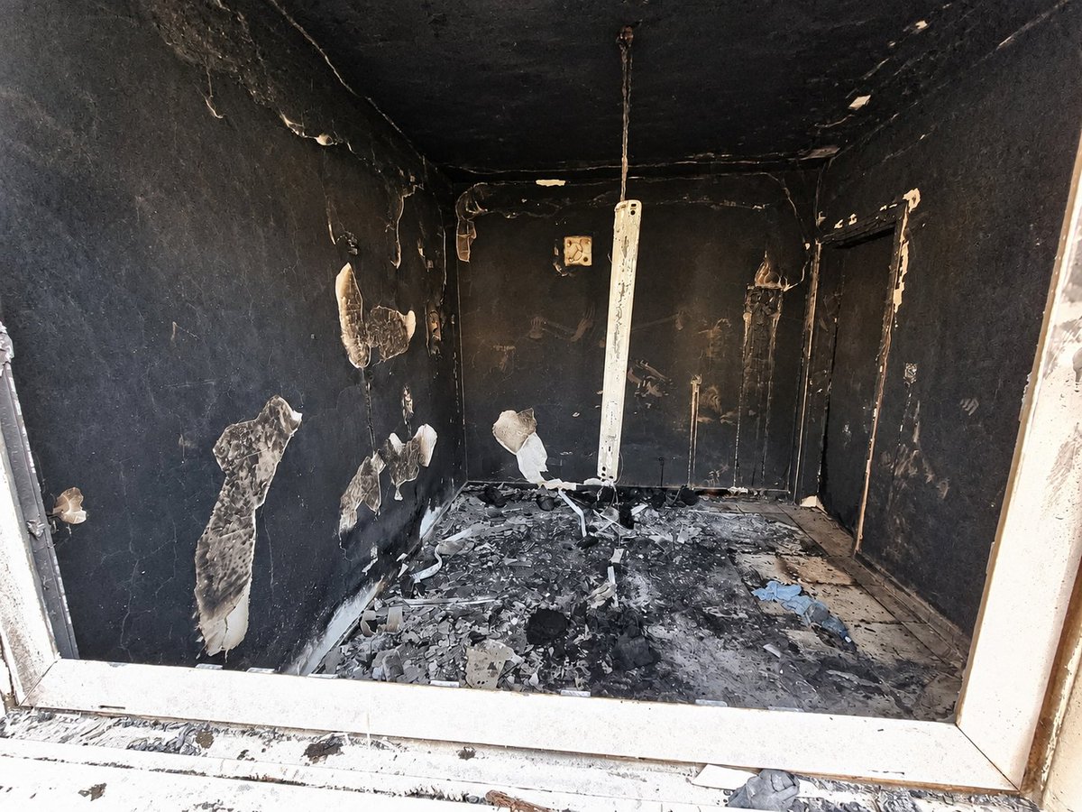 NoaMagid's tweet photo. On October 7, Ohad Cohen, his wife Sandra, and their three children - Liam, Dylan, and nine-month-old Mila - were trapped in the safe room of their home in Kibbutz Be’eri.

When terrorists broke into the house and tried to force their way into the safe room, Ohad held the door and fought to protect his family. Even after he was shot through the door in both legs, he refused to give up. The terrorists fired into the room, murdering baby Mila and severely wounding Sandra. Ohad called for help, begging for someone to rescue them. Help never came.

Then the terrorists set the house on fire. When the family could no longer breathe, Ohad pulled himself up using his hands, opened the window, and helped Sandra get the boys out. As they tried to escape, Ohad was shot and murdered. Nothing was left of their home.

Sandra and the boys eventually managed to hide and were evacuated only in the evening.

Sandra later said of Ohad: "He saved us. He was so brave and never gave up for a moment."

At the same time, Ohad's mother, Yona, 73, was also murdered in her home in Be’eri. For days, the family did not know what had happened to her.

Ohad and his nine-month-old daughter Mila were buried together, beside Yona.

On Ohad and Mila's gravestone, their loved ones chose words from the Pink Floyd song he loved:

"Shine on you crazy diamond."

I took the last two photos at their home after the massacre.