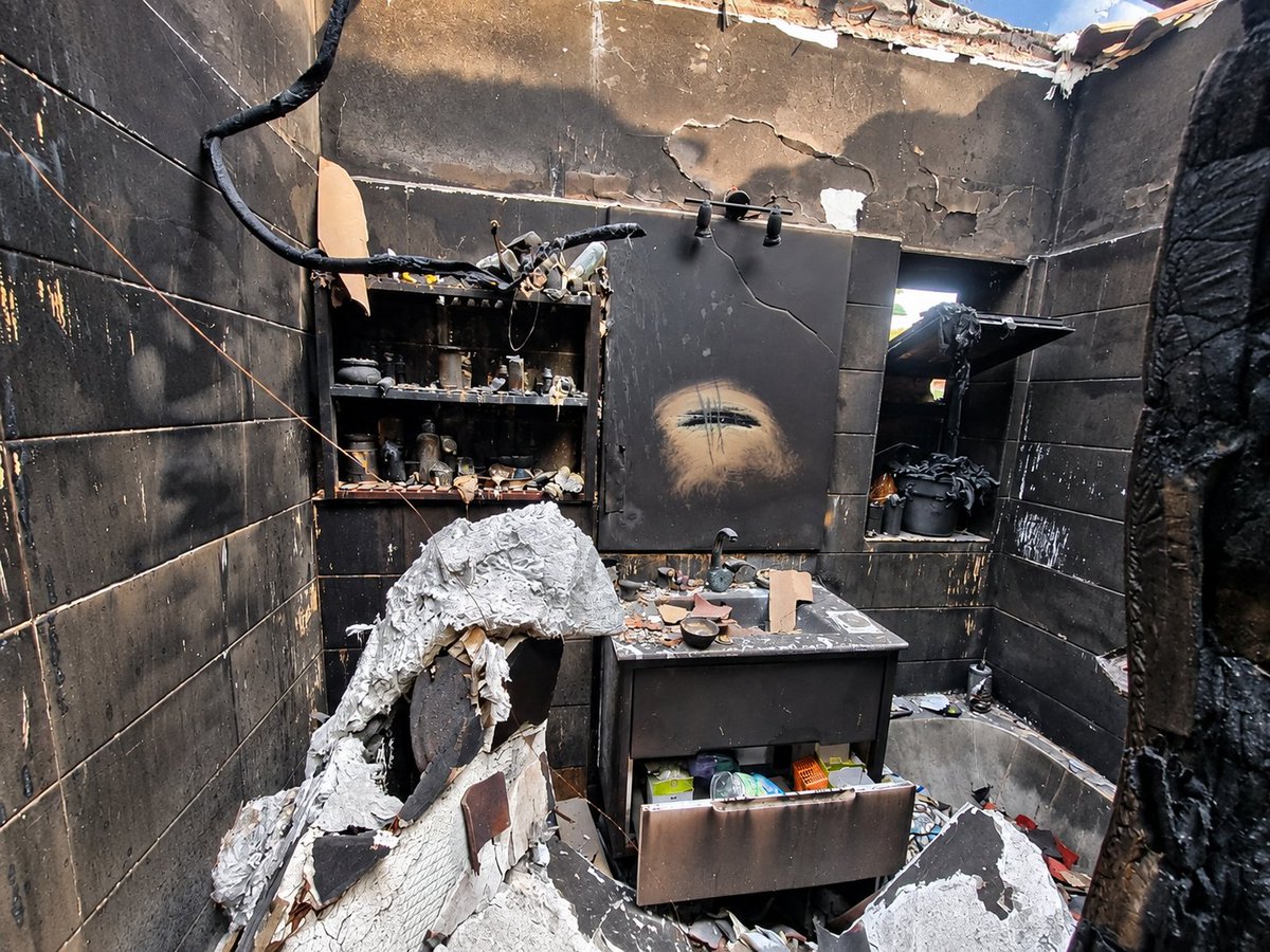NoaMagid's tweet photo. On October 7, Ohad Cohen, his wife Sandra, and their three children - Liam, Dylan, and nine-month-old Mila - were trapped in the safe room of their home in Kibbutz Be’eri.

When terrorists broke into the house and tried to force their way into the safe room, Ohad held the door and fought to protect his family. Even after he was shot through the door in both legs, he refused to give up. The terrorists fired into the room, murdering baby Mila and severely wounding Sandra. Ohad called for help, begging for someone to rescue them. Help never came.

Then the terrorists set the house on fire. When the family could no longer breathe, Ohad pulled himself up using his hands, opened the window, and helped Sandra get the boys out. As they tried to escape, Ohad was shot and murdered. Nothing was left of their home.

Sandra and the boys eventually managed to hide and were evacuated only in the evening.

Sandra later said of Ohad: "He saved us. He was so brave and never gave up for a moment."

At the same time, Ohad's mother, Yona, 73, was also murdered in her home in Be’eri. For days, the family did not know what had happened to her.

Ohad and his nine-month-old daughter Mila were buried together, beside Yona.

On Ohad and Mila's gravestone, their loved ones chose words from the Pink Floyd song he loved:

"Shine on you crazy diamond."

I took the last two photos at their home after the massacre.