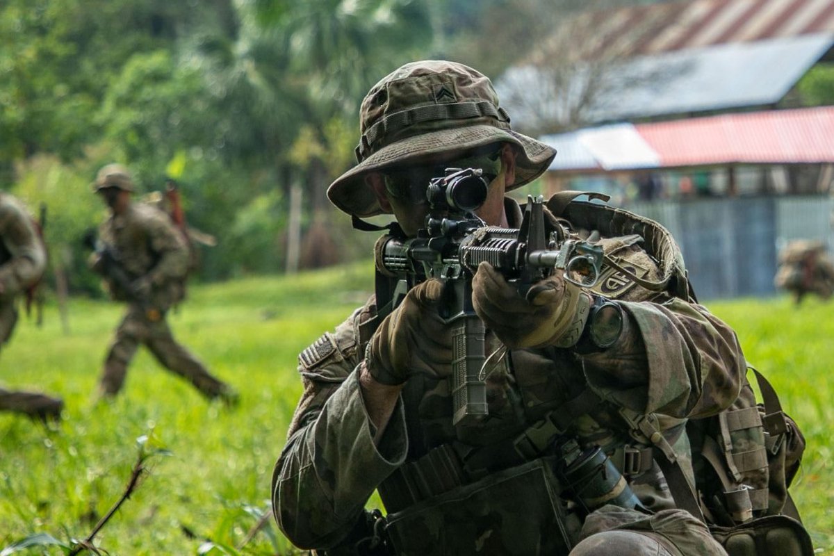 Soldiers with the 1-505th Parachute Infantry Regiment, 3rd Brigade Combat Team, 82nd Airborne Division, move during the final assault during the Southern Vanguard 26 field training exercise in Sauce, Peru.