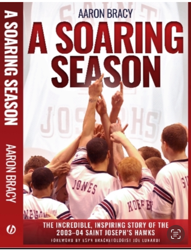 Aaron_Bracy's tweet photo. The banner is now hanging in Hagan Arena. The book telling the story of the season is available wherever books are sold! #0304stjoesbook https://t.co/yut2p35x5z