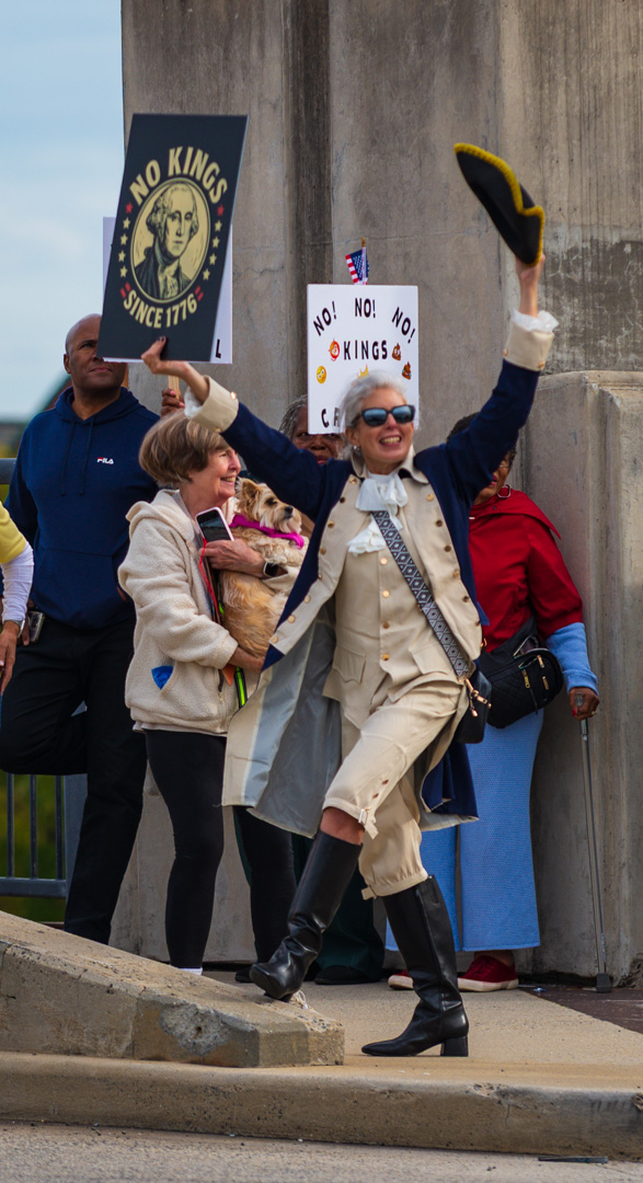 bfurman's tweet photo. Another clever costume celebrating No Kings Day in Alexandria, Virginia on the Route One bridge 10/18/25. #NoKingsDay #democracy #vote #alexandriavirginia https://t.co/DmpoFQpOMJ