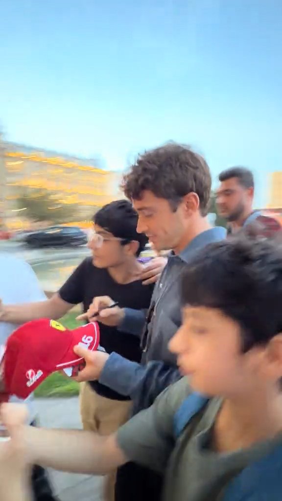 leclercsletters's tweet photo. charles with fans in baku today https://t.co/ka5wqz5Cik