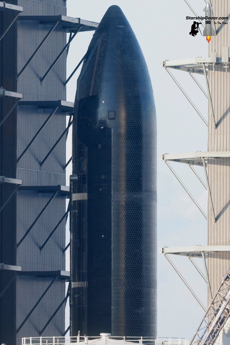 DxmonCsf's tweet photo. Ship 41 has moved out of Mega Bay 2, loaded with the first 26 operational Starlink V3 satellites, and is headed for rollout to Pad 2 for stacking with Booster 21.

NET remains September 28 for Flight 14’s first sustained orbit attempt.

At the gate the independent 50-ft bronze Prometheus by @AtelierMissor_ keeps watch.

$Prometheus #Starbase #ElonMusk